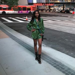 Green long sleeve romper by Hunter